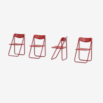 Red metal folding chairs 1980s
