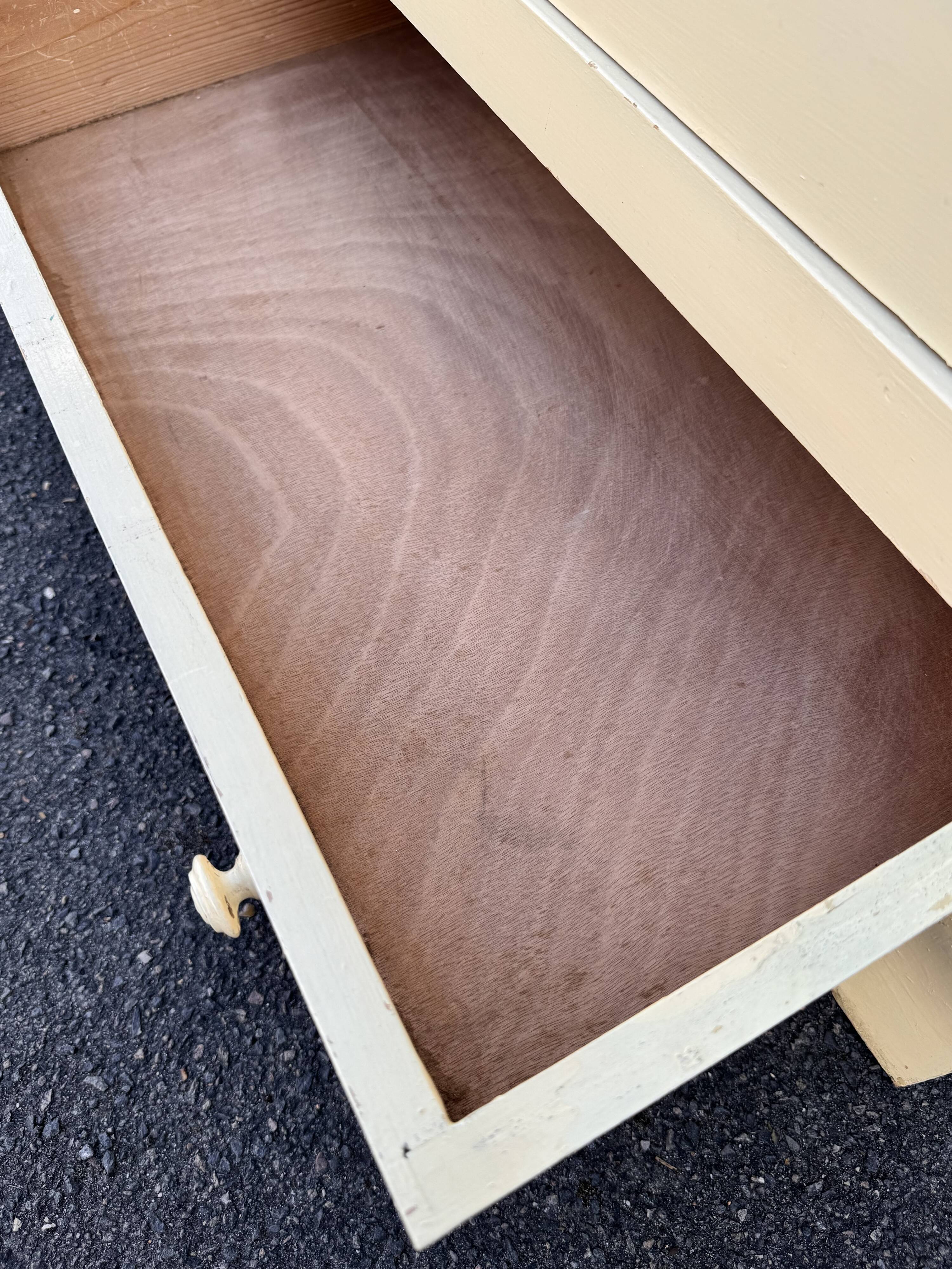 Antique painted wooden bonnet maker