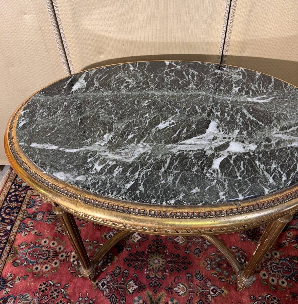 Louis XVI style pedestal table in gilded wood