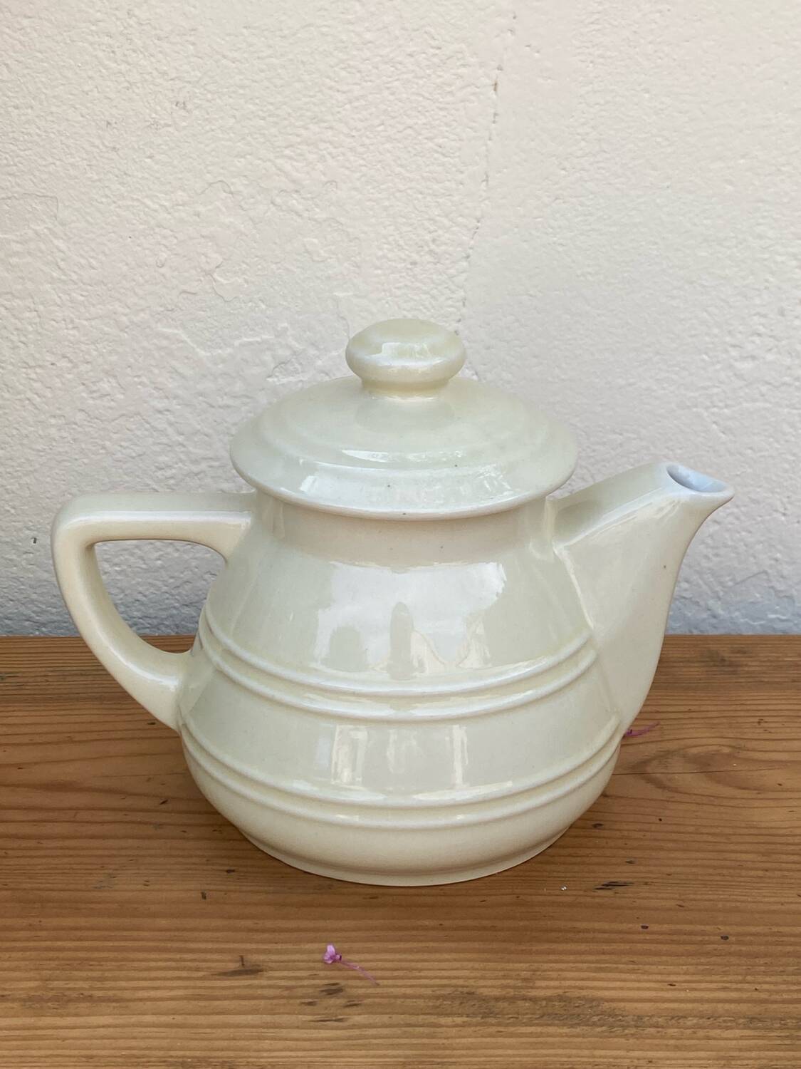 White ceramic teapot
