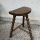Half-moon pearl tripod stool