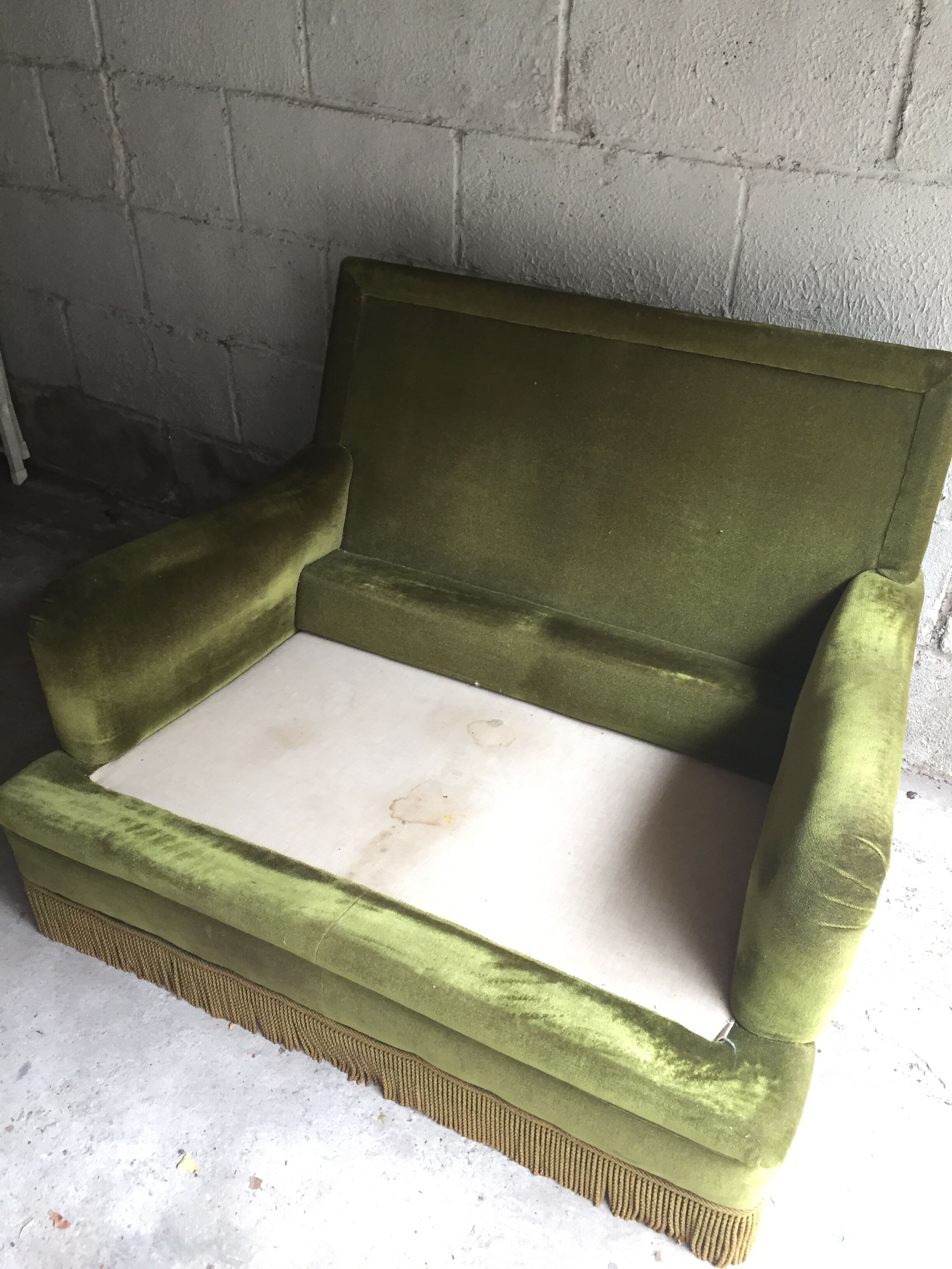 Vintage green velvet sofa