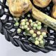 Large woven bowl and trompe l'œil fruits