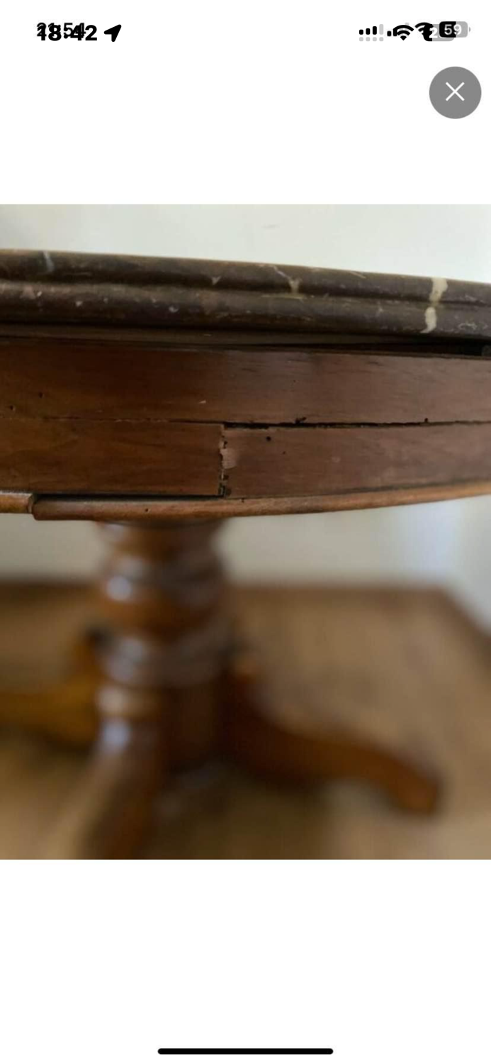 Table in walnut with a marble top in Louis Philippe style.