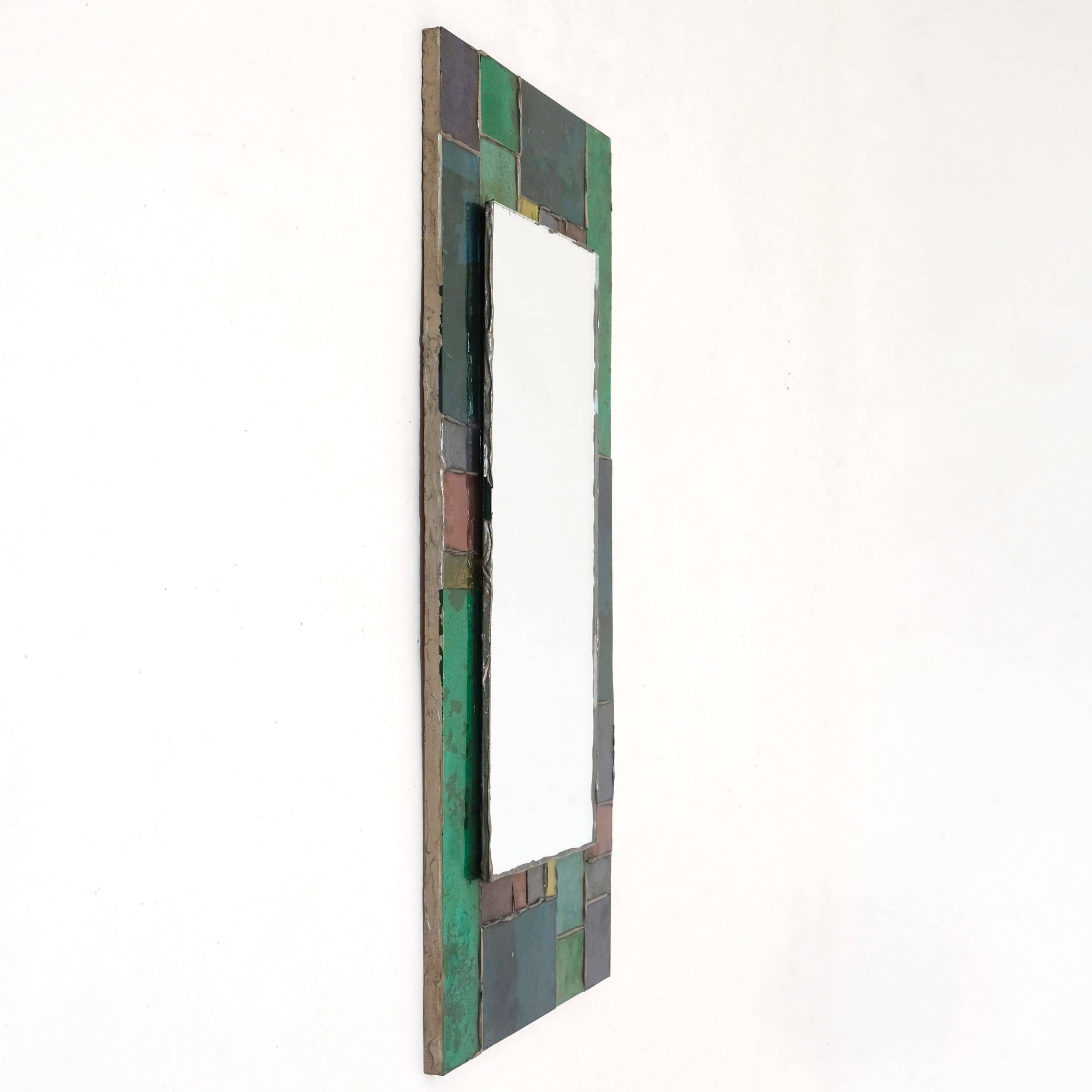 Coloured glass mirror, French work from the 1960s, 35x77 cm.