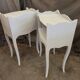 Light grey patinated bedside tables