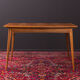 Walnut dining table from the 1950s