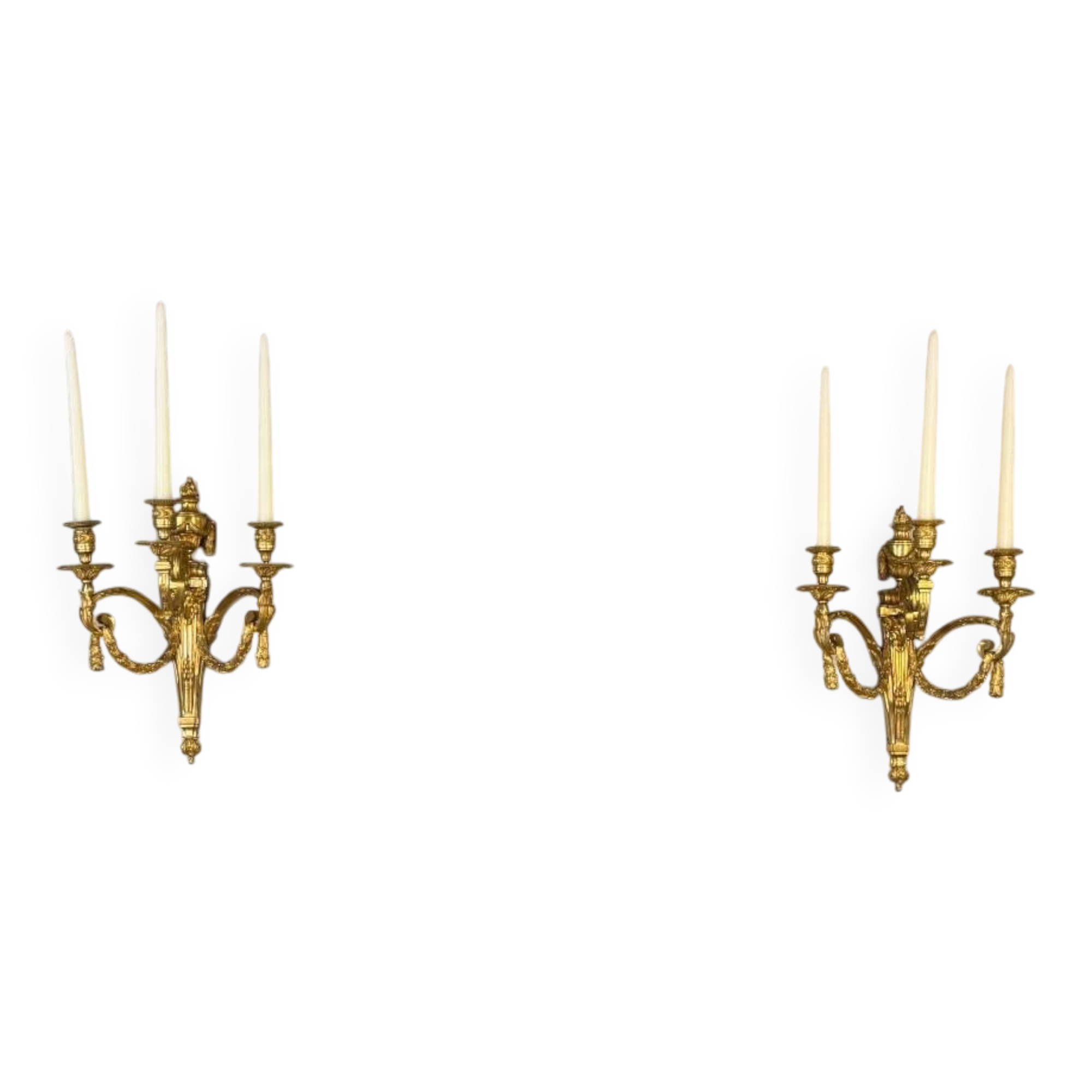 Pair of Louis XVI style wall sconces in gilded bronze, circa 1880.