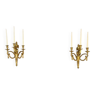 Pair of Louis XVI style wall sconces in gilded bronze, circa 1880.