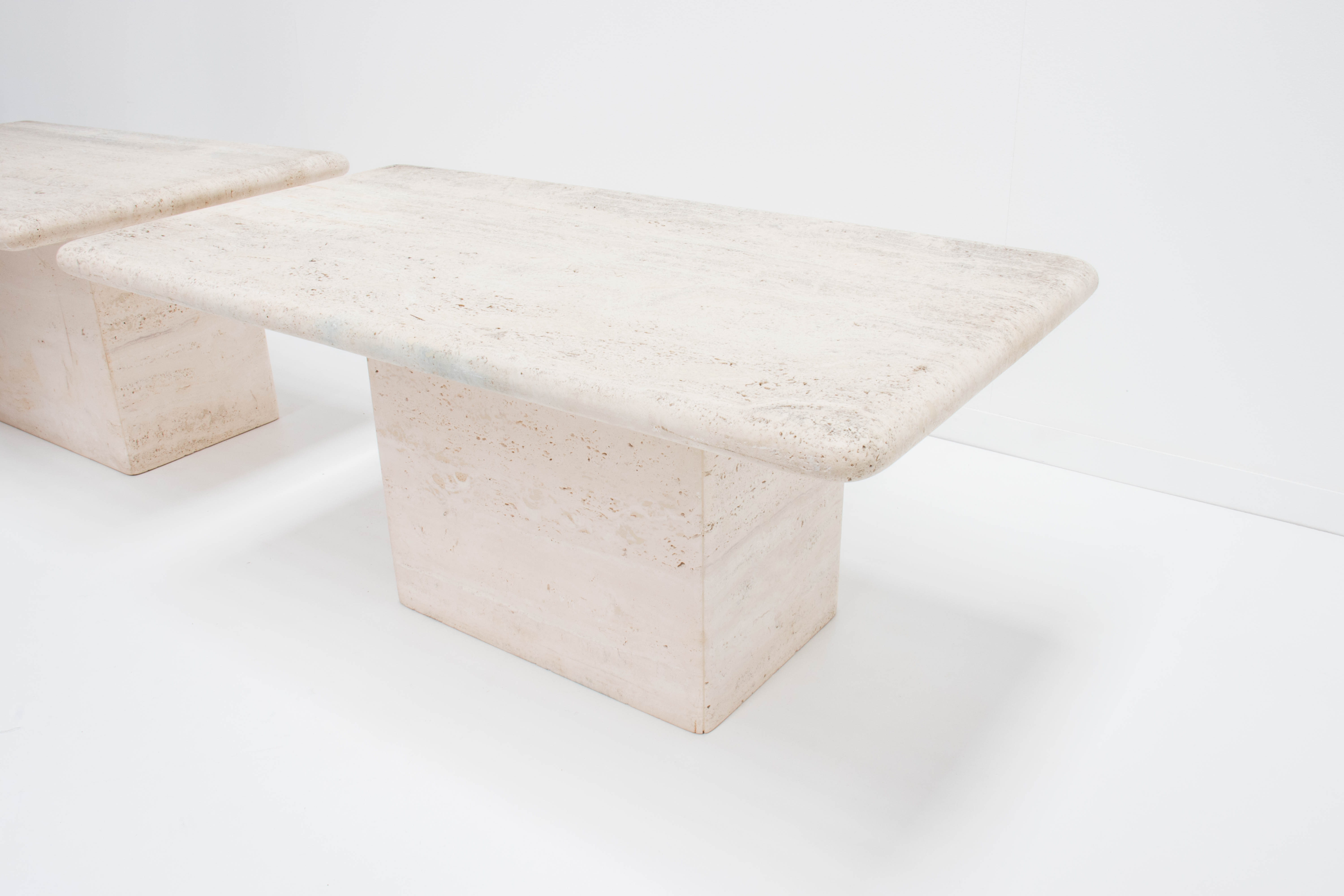 Travertine bedside tables