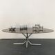 Table basse années 70 chrome et verre fumé