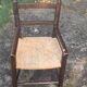 Small vintage wooden and straw children's chair