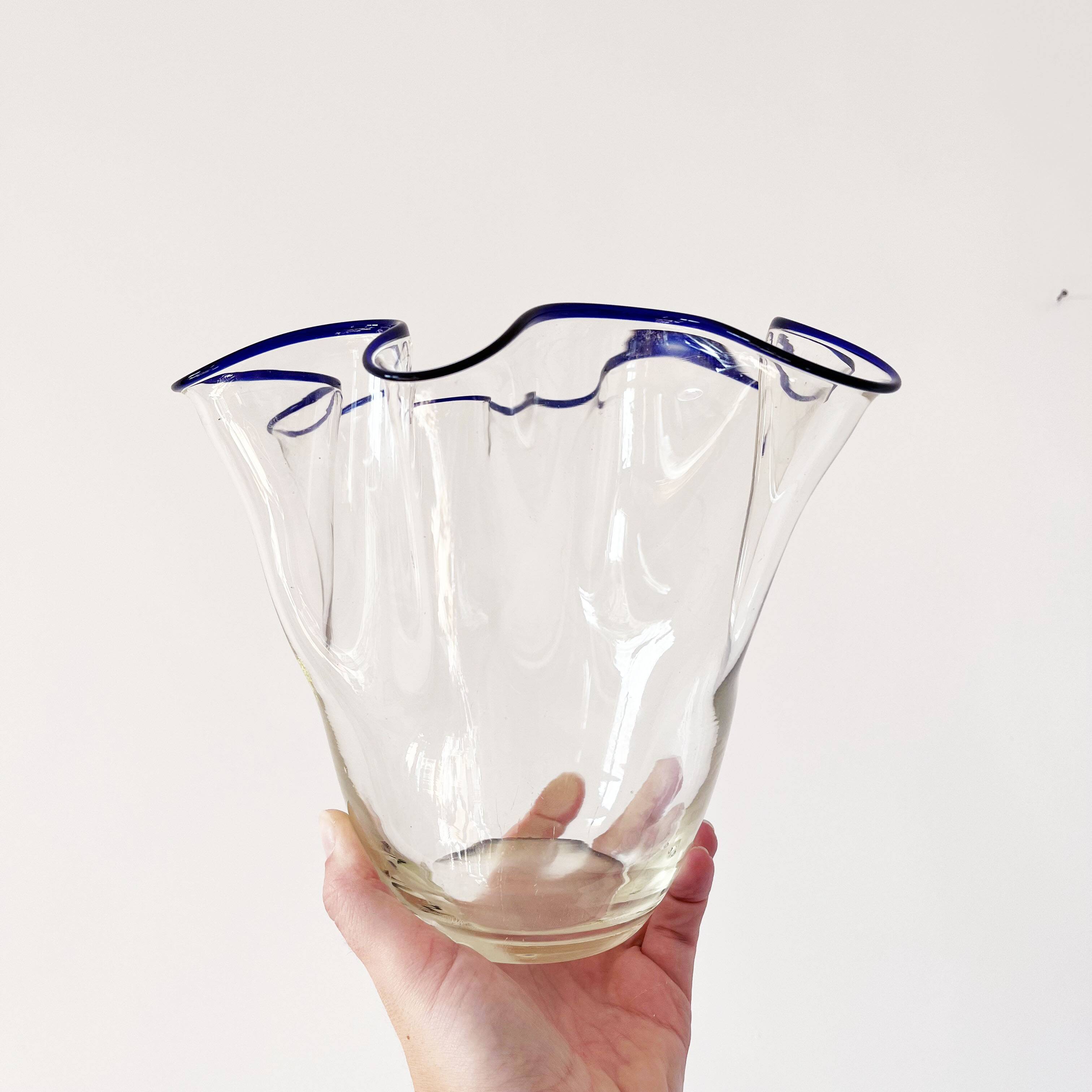 Blue-edged blown glass handkerchief vase