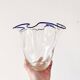 Blue-edged blown glass handkerchief vase