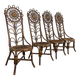 Set of 4 bamboo and rattan chairs with sunflower decoration.