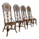 Set of 4 bamboo and rattan chairs with sunflower decoration.