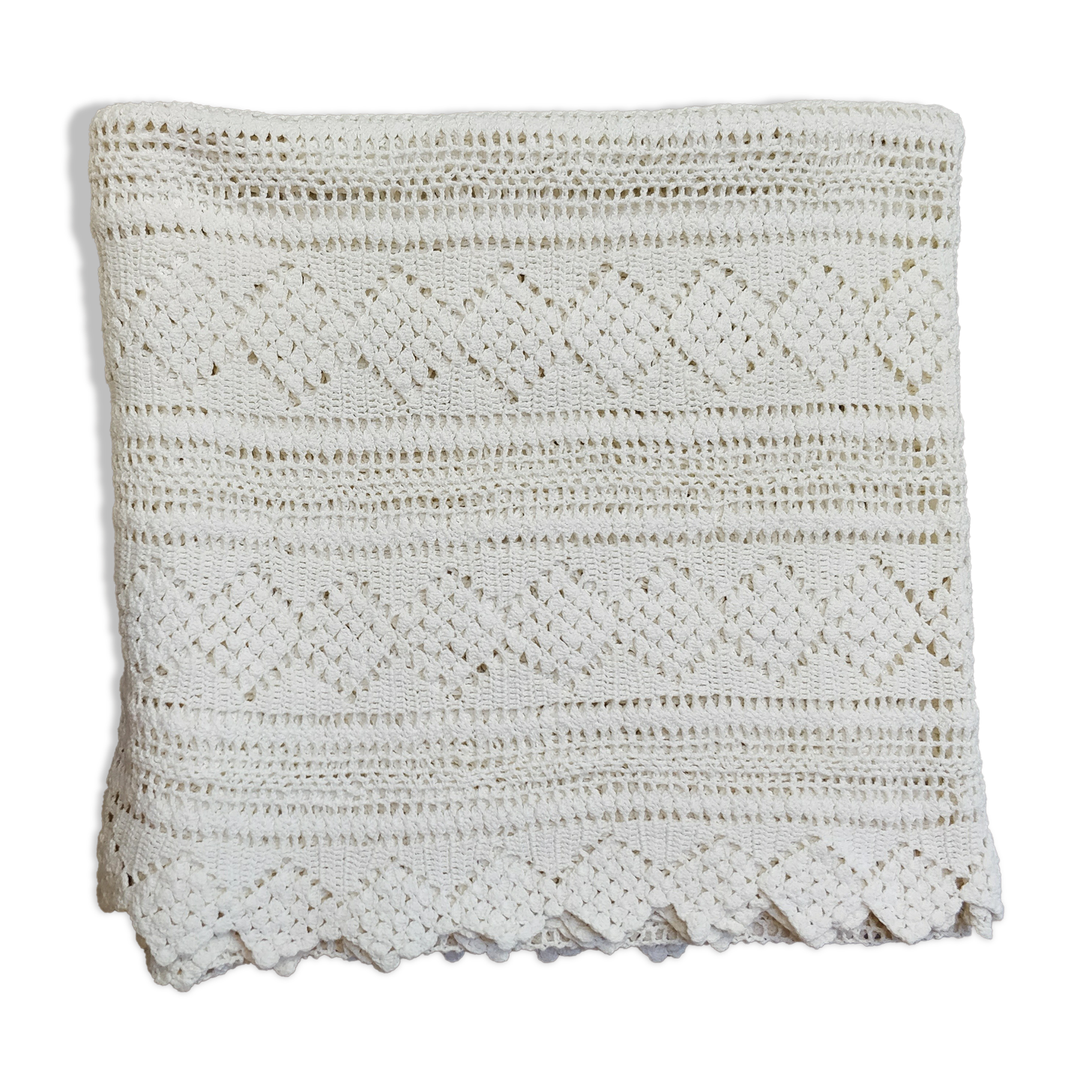 White two-seater crocheted bed top
