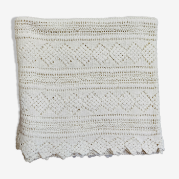 White two-seater crocheted bed top