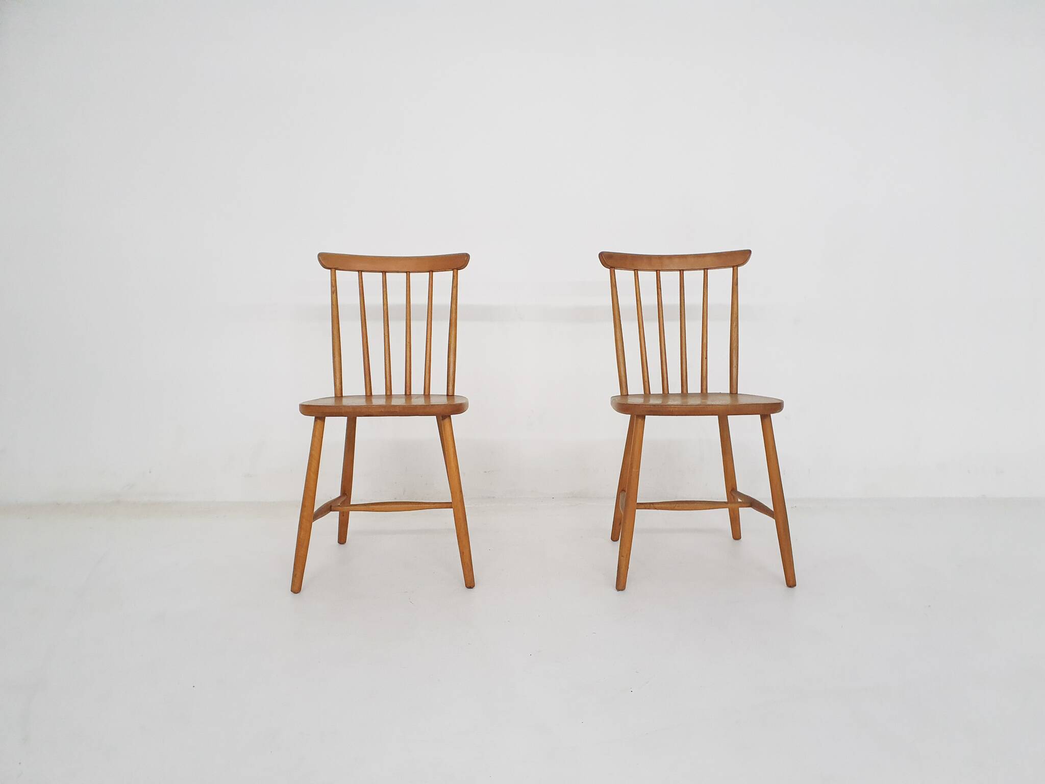 Set of two spindle back chairs, The Netherlands 1950's