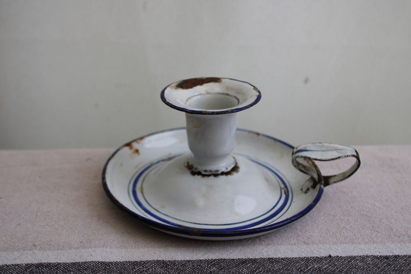 Old enamel candle holder