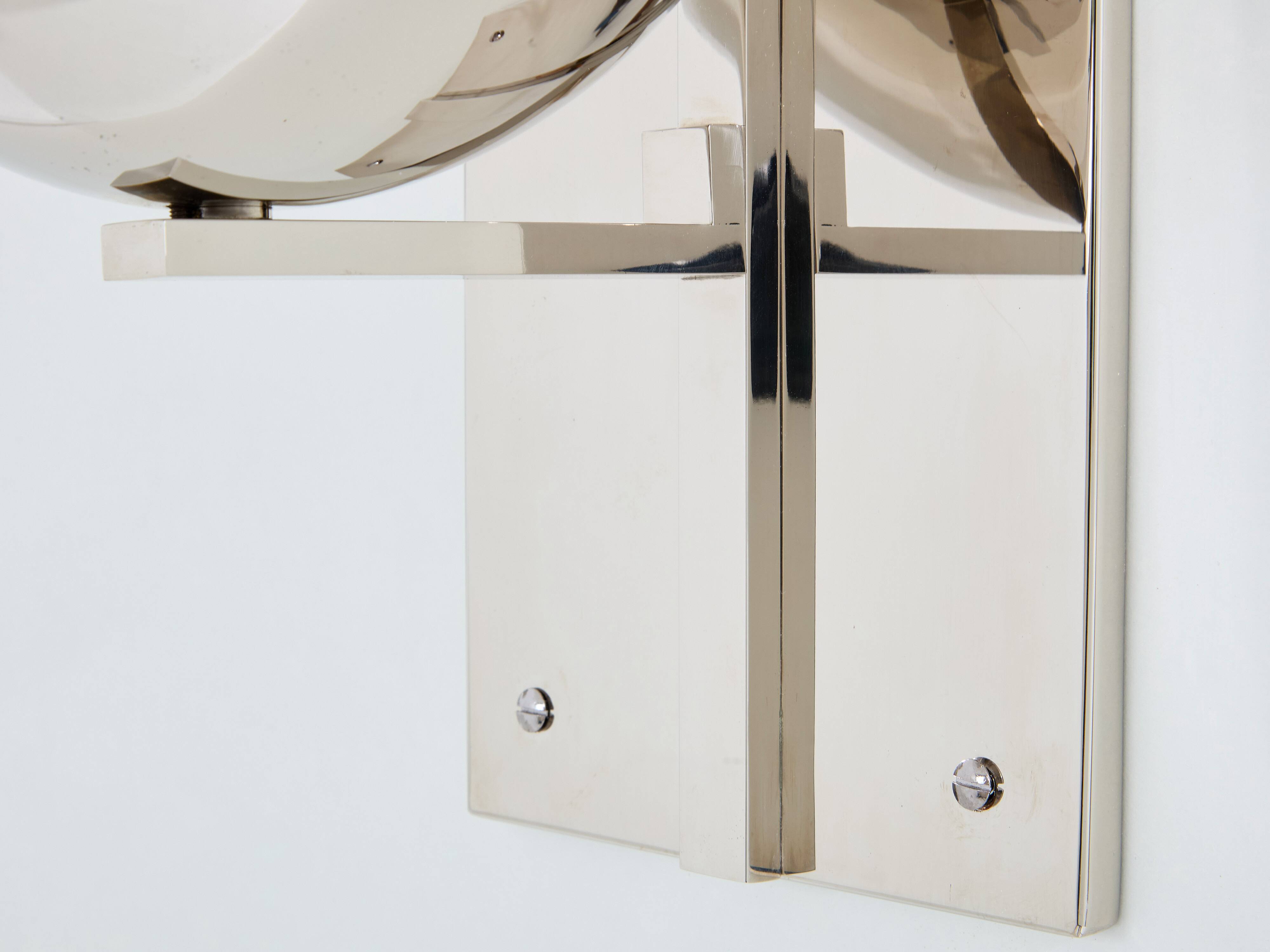 Pair of modernist wall lights by Claude Parent, nickel-plated steel, 1992.