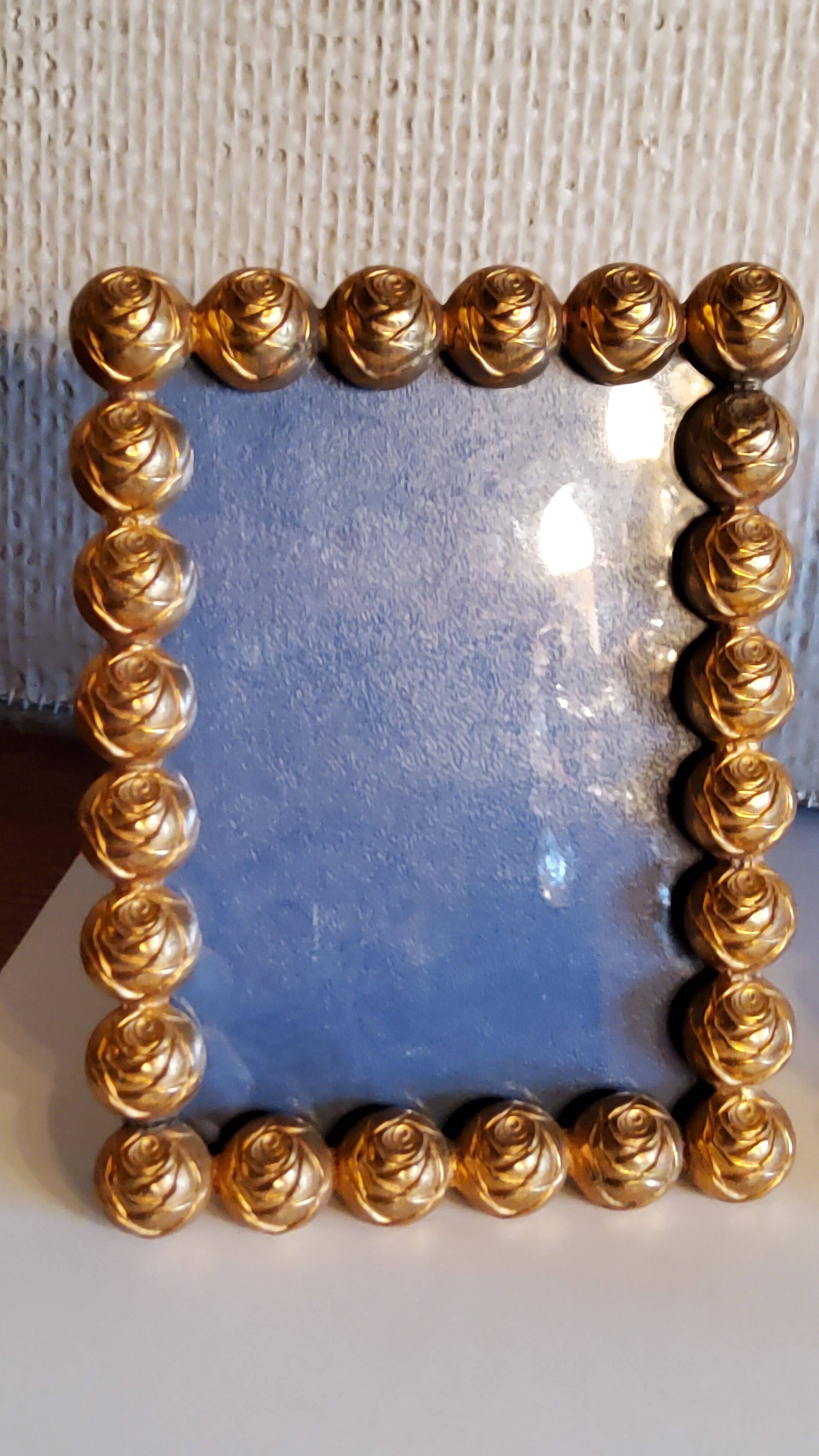 Pair of art deco photo frames in gilded bronze and gilded brass