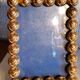 Pair of art deco photo frames in gilded bronze and gilded brass