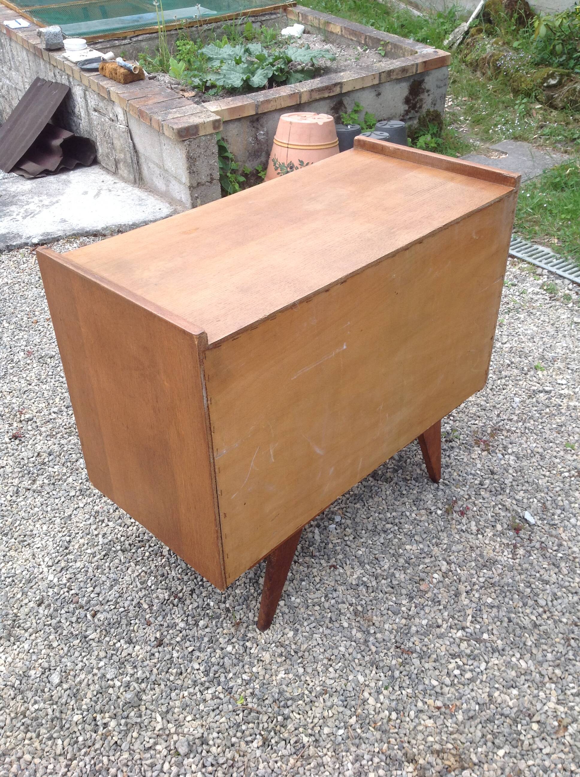 Vintage 1960s commode with compass legs.