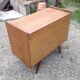 Vintage 1960s commode with compass legs.