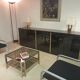 Black lacquered and brass design 70/80