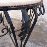 Round coffee table in wrought iron and on marble
