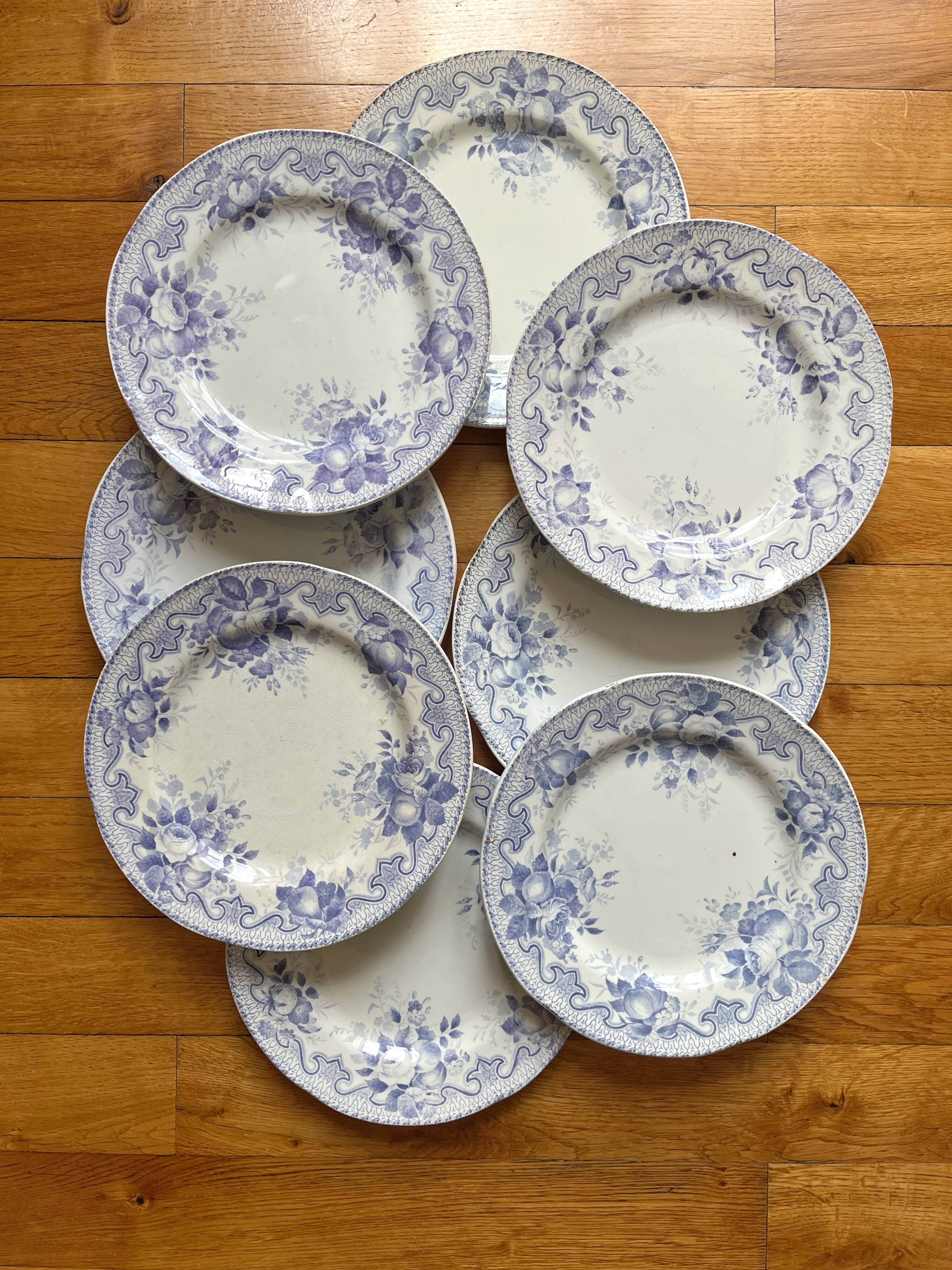 8 flat ironware plates Bouquets, Creil and Montereau late 19th century