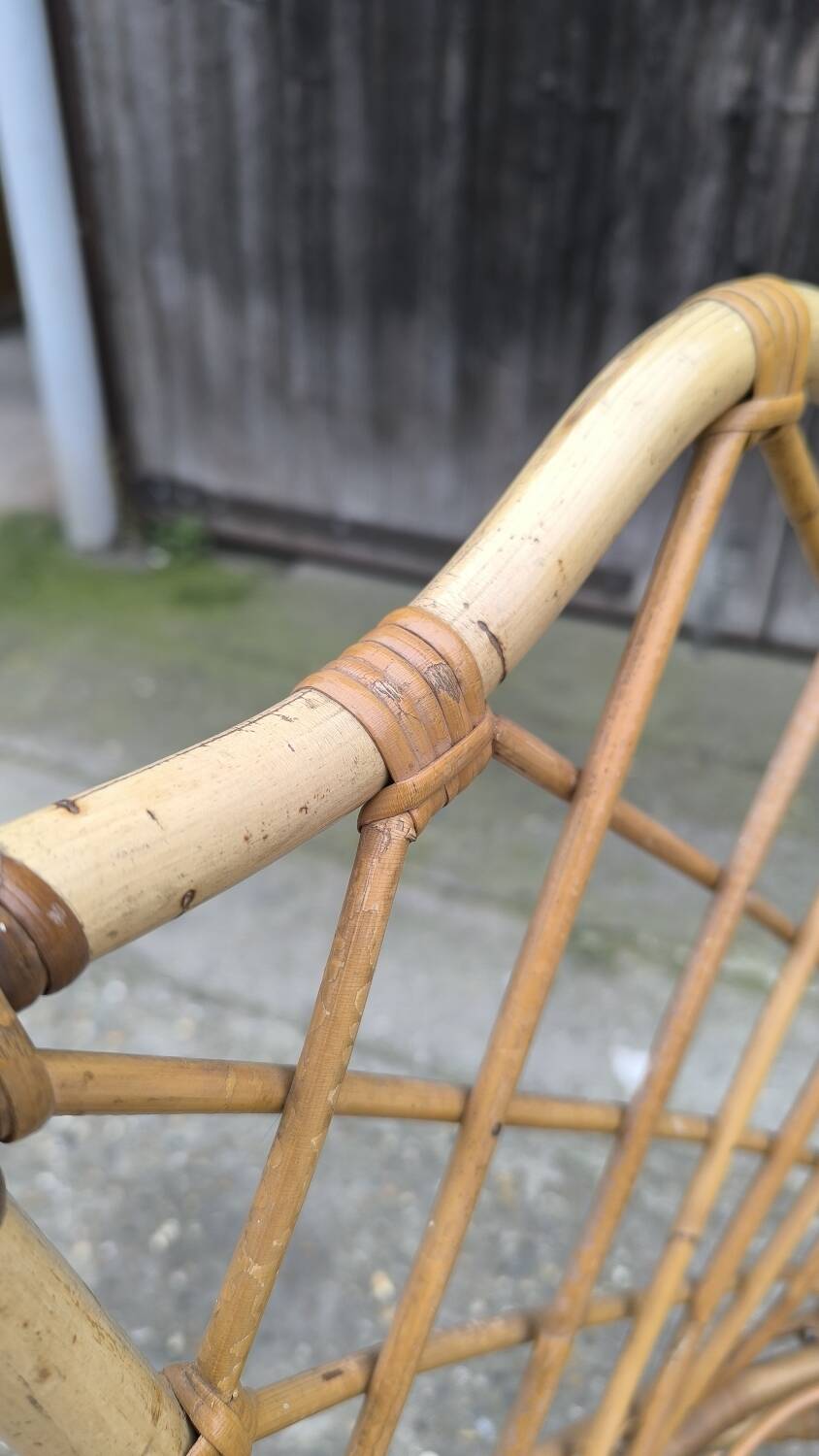 Rattan chair by Louis Sognot 1960