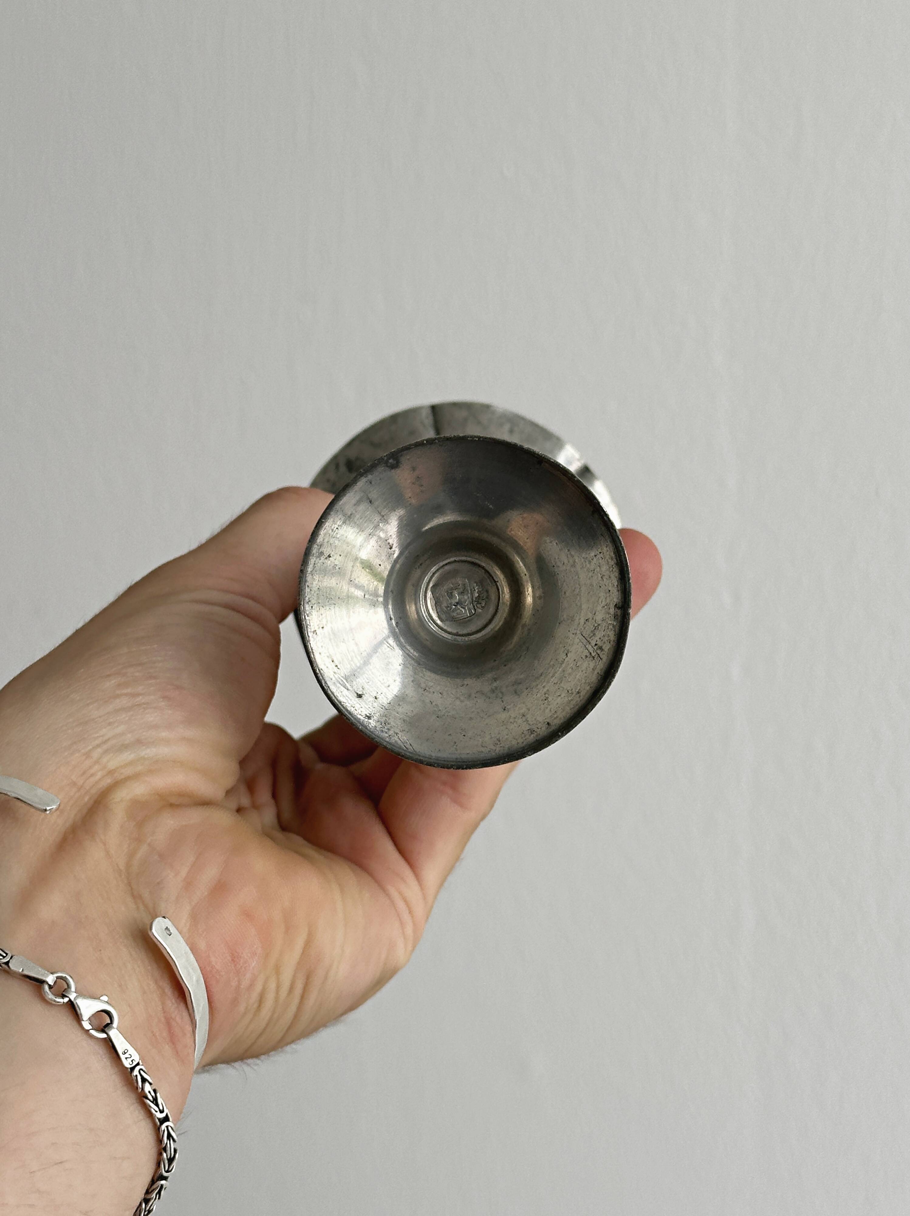 Patinated metal vase