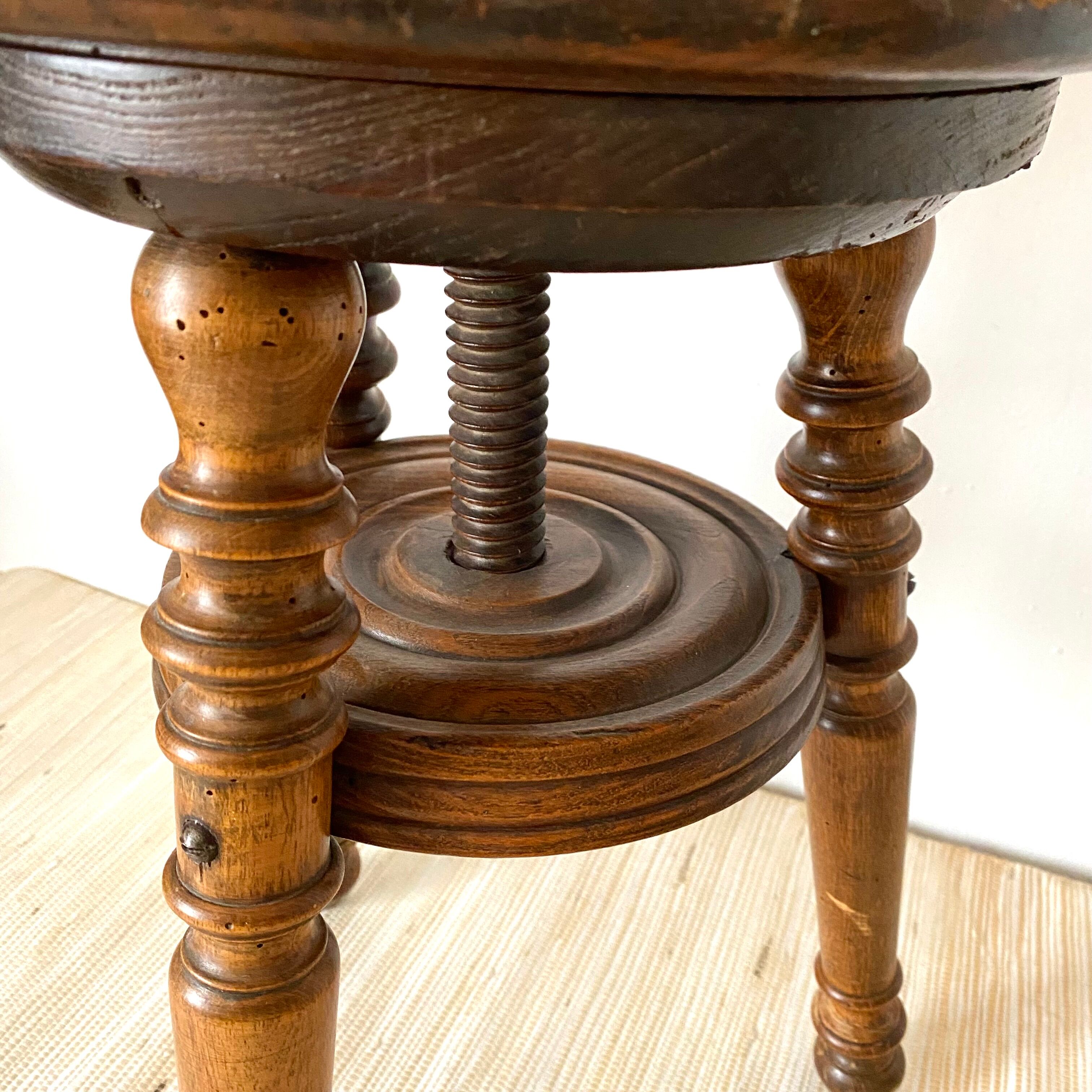 Antique screw piano stool