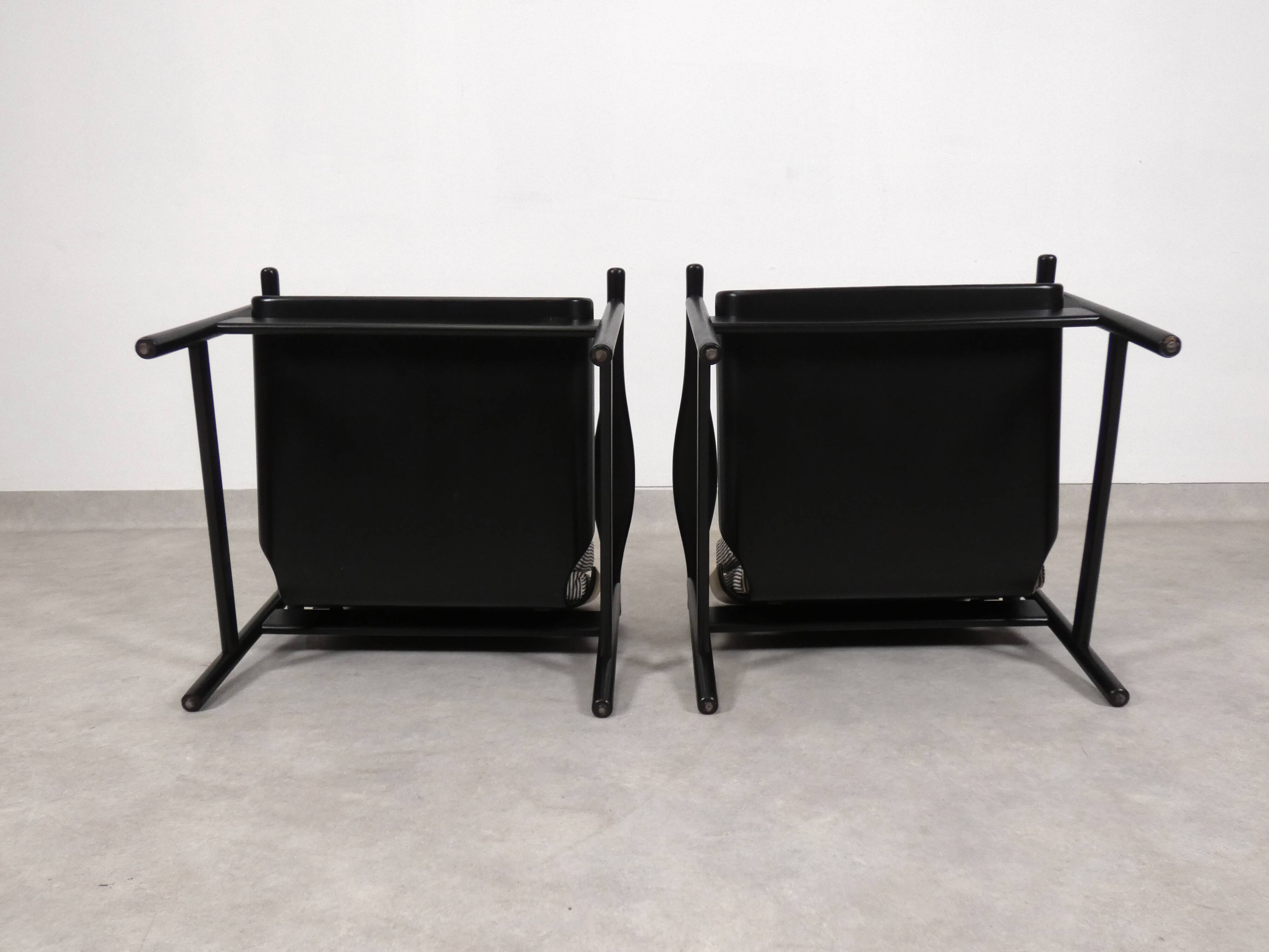 2x wooden Scandinavian arm chairs