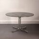 Round dining table in smoked glass and chrome-plated steel, Italy, 1970