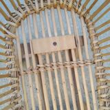 Rattan cradle for doll on vintage wheels