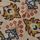 Un tapis persan oriental crème à motifs floraux – Élégance classique