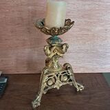 Gilded bronze candle holder with religious swans