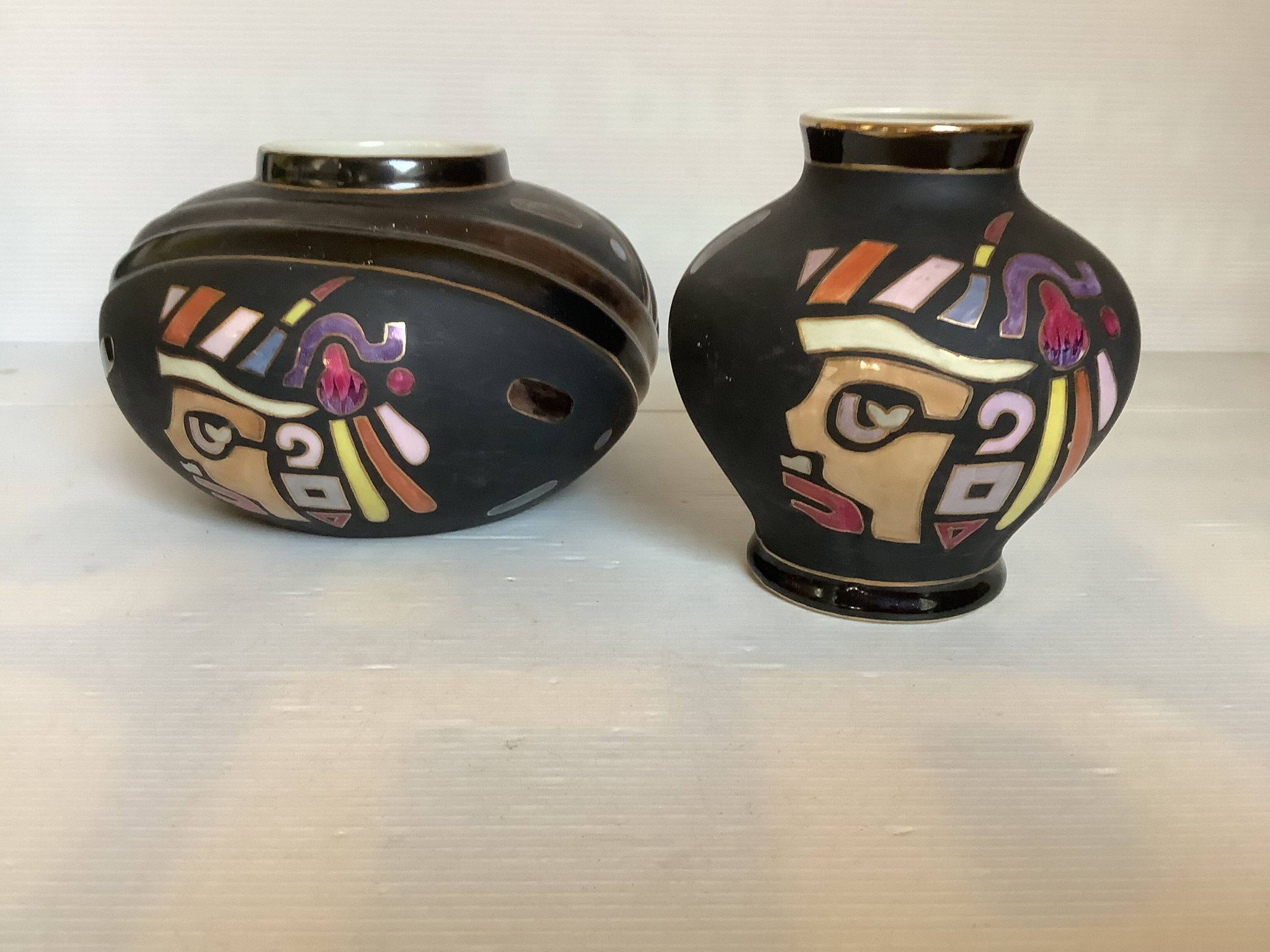 Pair of matte and glazed ceramic vases