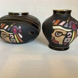 Pair of matte and glazed ceramic vases