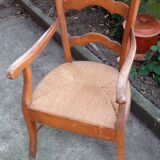 Old straw armchair