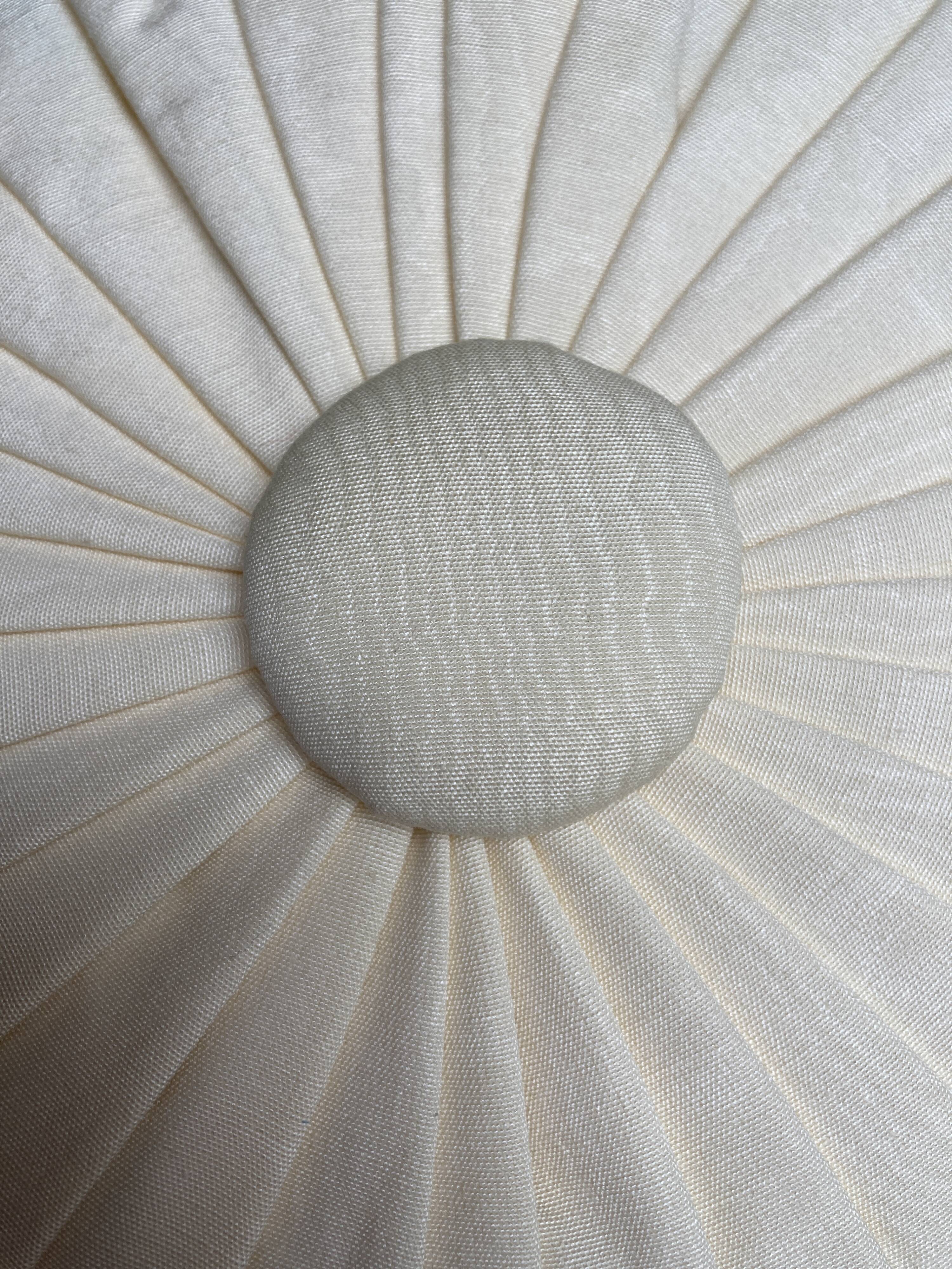 Cushion in beige fabric