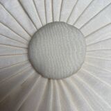 Cushion in beige fabric