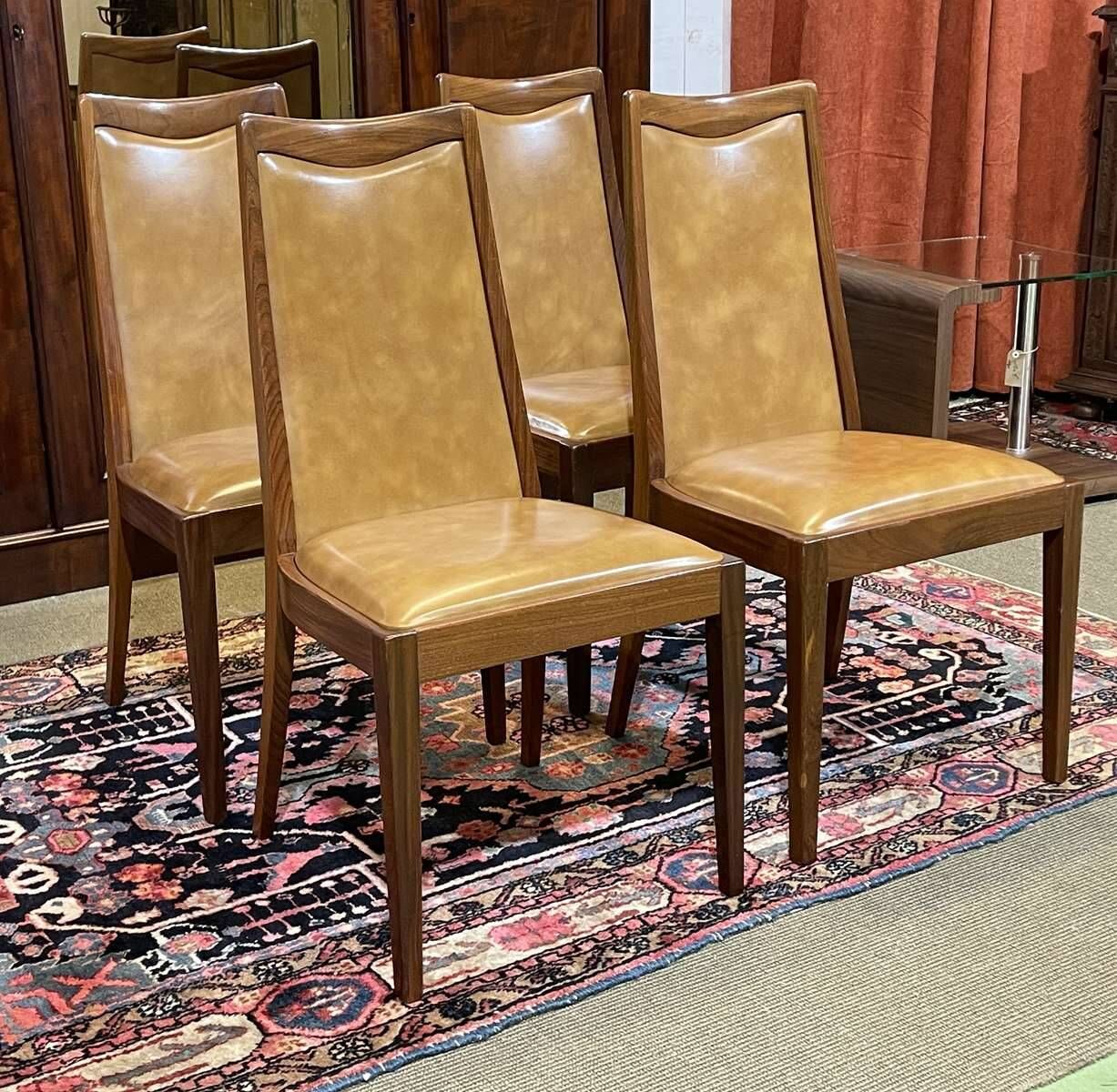 Set of 4 G-Plan chairs in teak and faux leather from the 1970s.