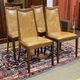 Set of 4 G-Plan chairs in teak and faux leather from the 1970s.