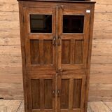 Art Deco glass-fronted cabinet in Burmese teak with original patina.