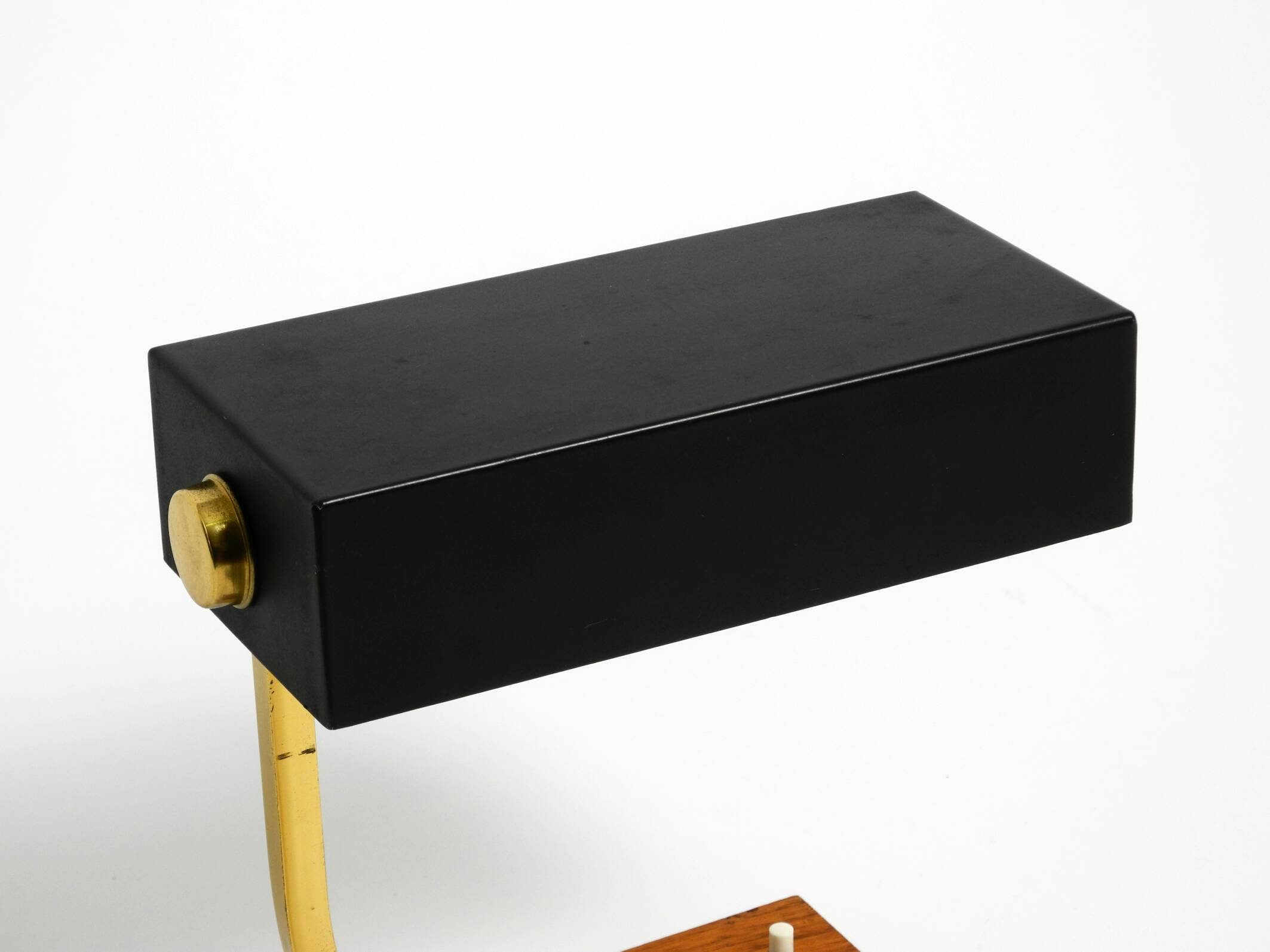 Beautiful small Mid Century Modern metal and brass table lamp with teak bas