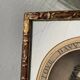 Classic antique man portrait in gilded frame